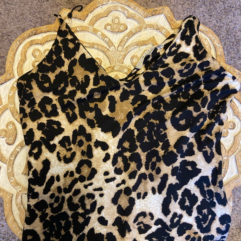 Brand new cheetah bodysuit, size small